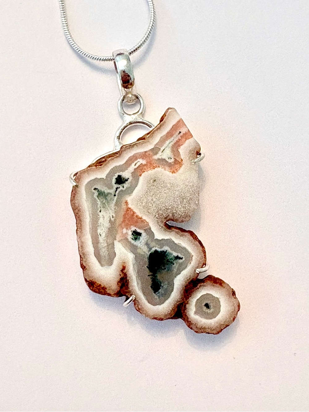 2 inch, natural edges, Tree Agate in Solar Slice pendant on a silver chain.